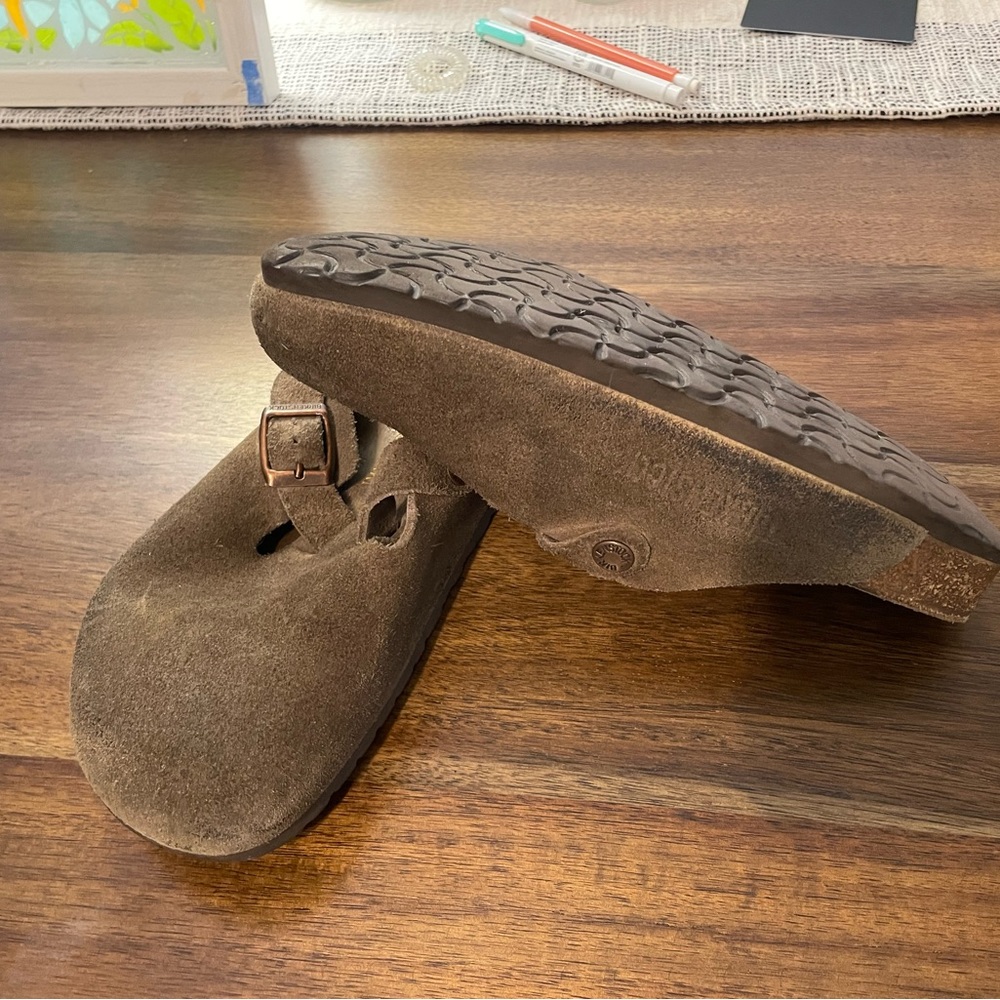 Birkenstock. Worn but lots of good life left!